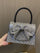 Crystal Bow Embellished Top Handle Clutch MNBF139