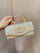 Diagonal Ribbed Pearl Embellishment Clutch  MNBF140